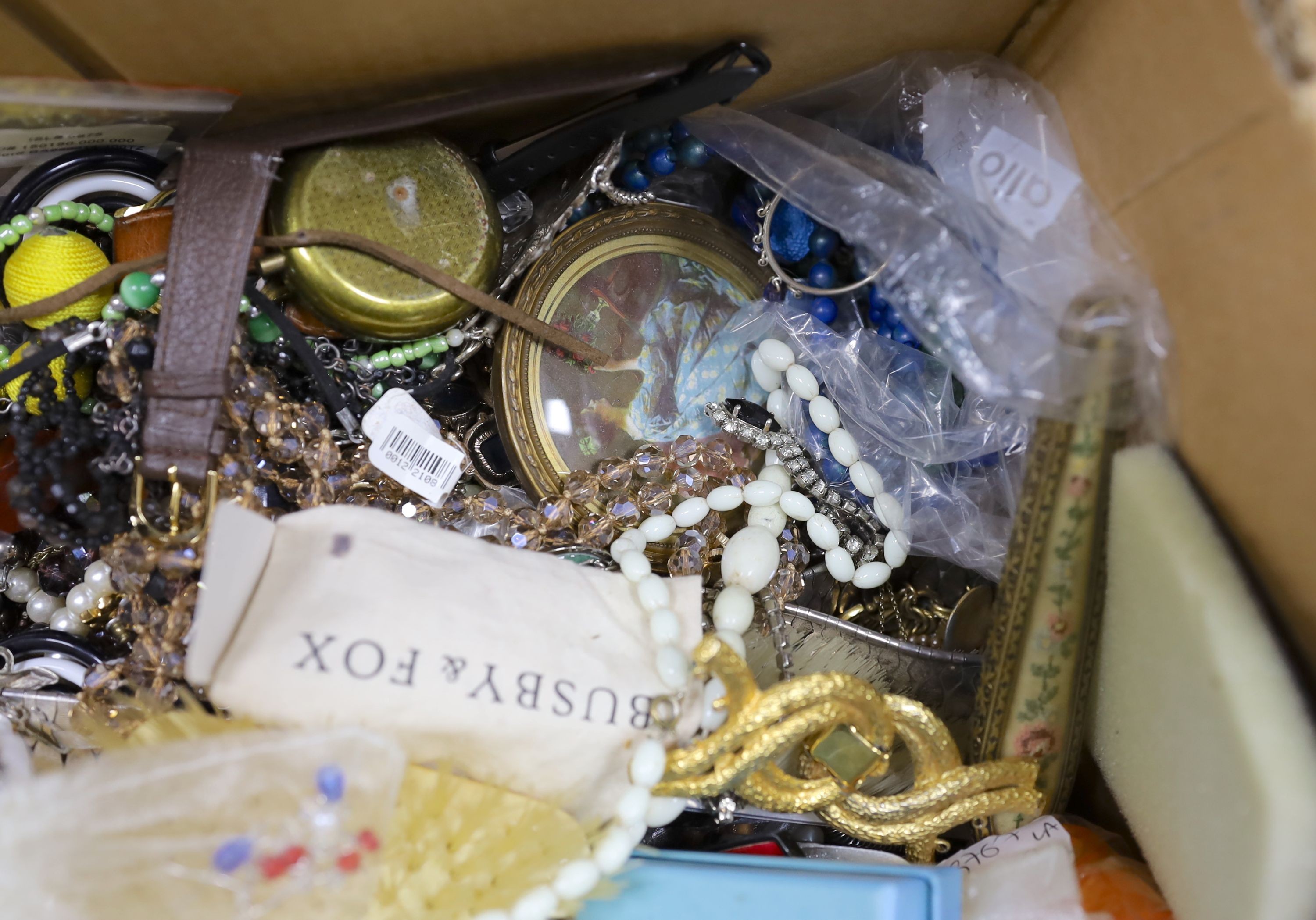 A large quantity of costume jewellery, clocks, watches, dressing table brushes etc.